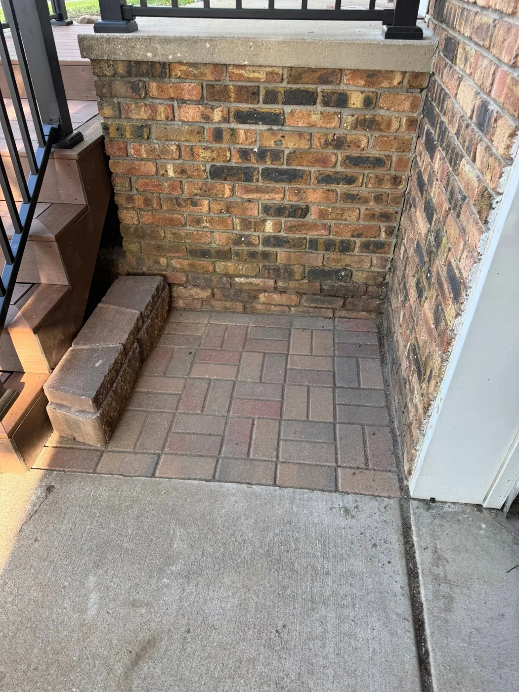 Rebuilt brick paver steps at a home entrance in Pekin, IL