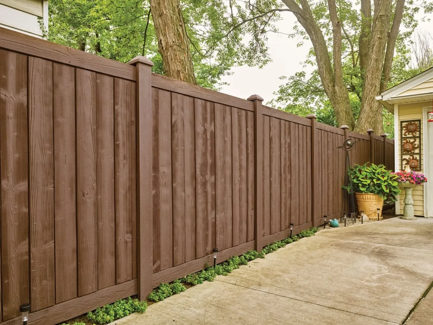 Wood-tone privacy fence panel